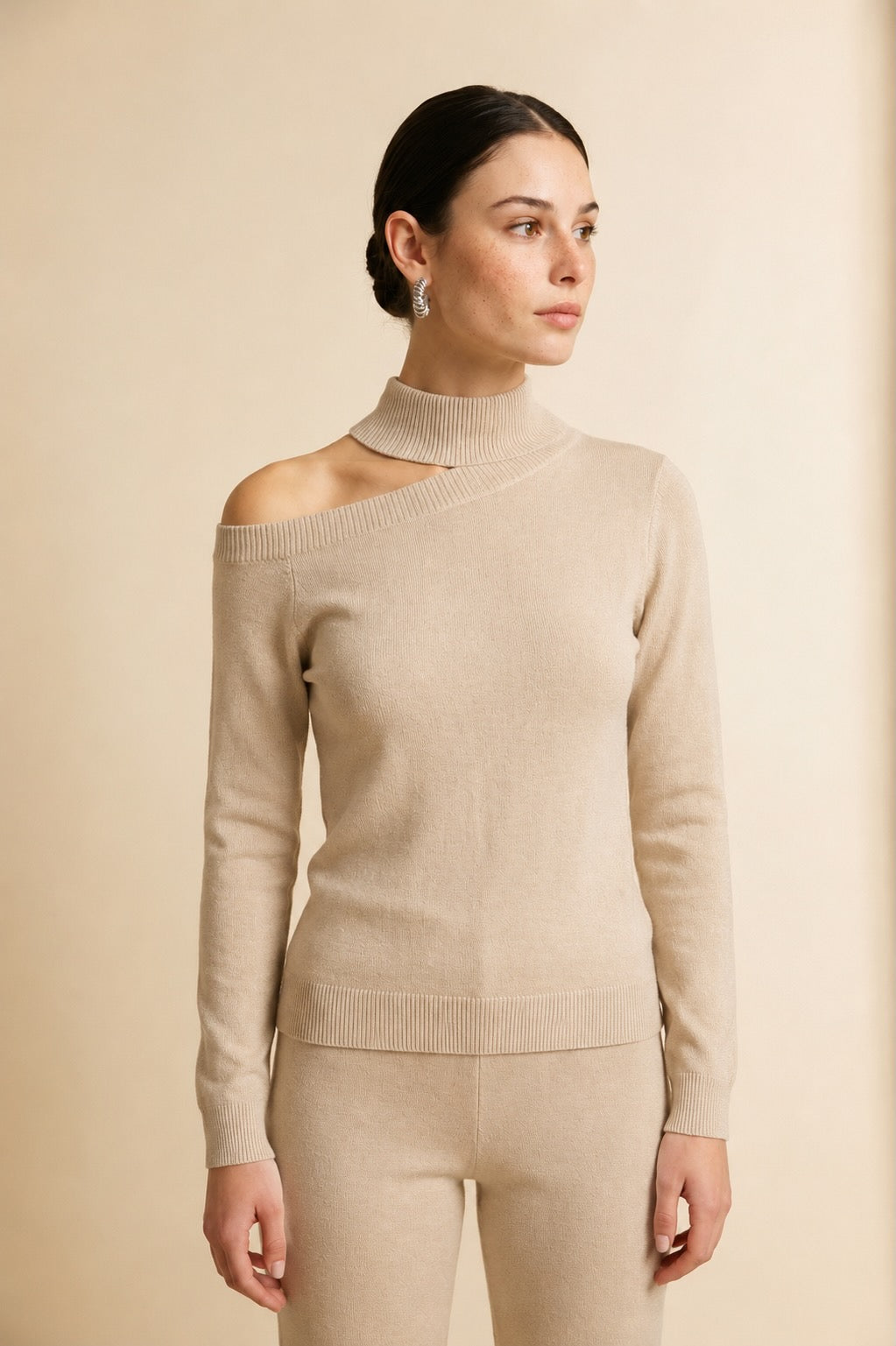 Cleo Asymmetrical Shoulder Cut-Out Turtleneck Top in Beige | Casa Maly