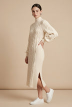 Maia Longo long-sleeve knit midi dress in off white featuring a round neckline and fitted silhouette