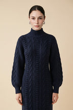Maia Longo long-sleeve knit midi dress in navy blue featuring a round neckline and fitted silhouette
